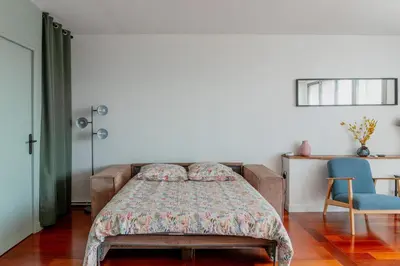 Un ou plusieurs lits dans un hébergement de l'établissement Bel appartement F2 42 m2