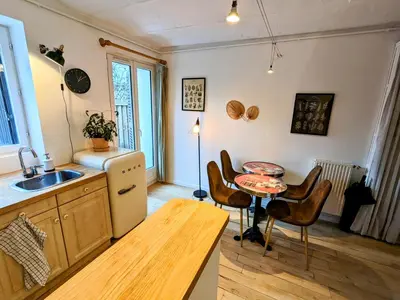 Coin salon dans l'établissement Peaceful apartment with private garden