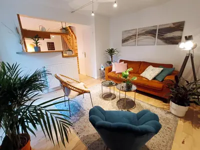 Coin salon dans l'établissement Peaceful apartment with private garden