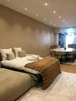 Coin salon dans l'établissement Pic de Nôtre Dame, Charming Suites Paris