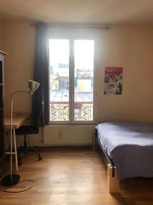 Un ou plusieurs lits dans un hébergement de l'établissement Parigi XI grande appart 2 camere da letto bagno privato 4 e più ospiti