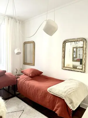 Un ou plusieurs lits dans un hébergement de l'établissement Studio climatisé pour 1 ou 2 personnes au 109 avenue Mozart Paris 16