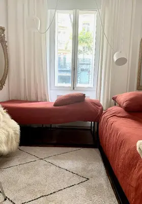 Un ou plusieurs lits dans un hébergement de l'établissement Studio climatisé pour 1 ou 2 personnes au 109 avenue Mozart Paris 16