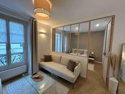 Coin salon dans l'établissement Cocooning & Cosy Apartment in Center Paris 17