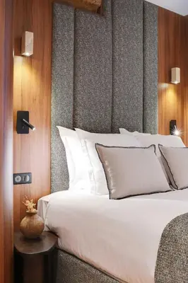 Un ou plusieurs lits dans un hébergement de l'établissement Luxury in the heart or Paris-Notre Dame