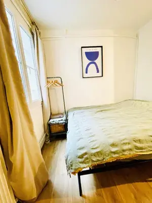 Un ou plusieurs lits dans un hébergement de l'établissement STUDIO TOURNELLES 75003 Paris Center