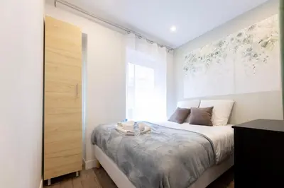 Un ou plusieurs lits dans un hébergement de l'établissement Nets Inn Apartments - Saint Lazare