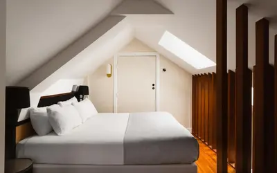 Un ou plusieurs lits dans un hébergement de l'établissement Limehome Paris Montmartre