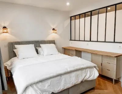 Un ou plusieurs lits dans un hébergement de l'établissement Luxury Penthouse Eiffel Tower view