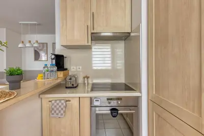 Cuisine ou kitchenette dans l'établissement Metro - Ascenseur - Parking - Wifi - 4 pers - Easy Check IN