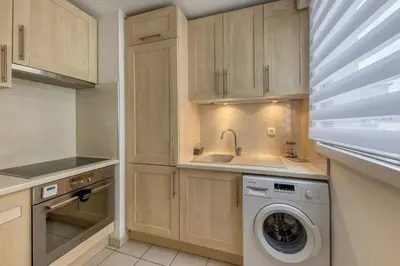 Cuisine ou kitchenette dans l'établissement Metro - Ascenseur - Parking - Wifi - 4 pers - Easy Check IN