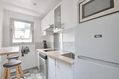 Cuisine ou kitchenette dans l'établissement Appartement Martino - Welkeys