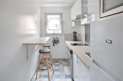 Cuisine ou kitchenette dans l'établissement Appartement Martino - Welkeys