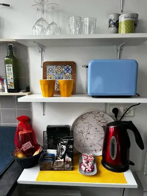 Cuisine ou kitchenette dans l'établissement Cosy studio Paris Opera with lift Ascenseur