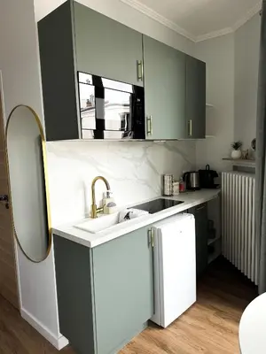 Cuisine ou kitchenette dans l'établissement Studio de charme parisien