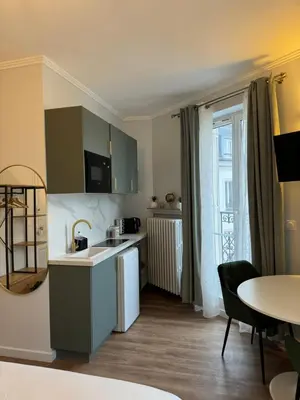 Cuisine ou kitchenette dans l'établissement Studio de charme parisien
