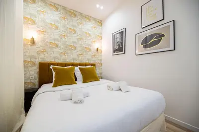 Un ou plusieurs lits dans un hébergement de l'établissement Cosy home - Haut marais