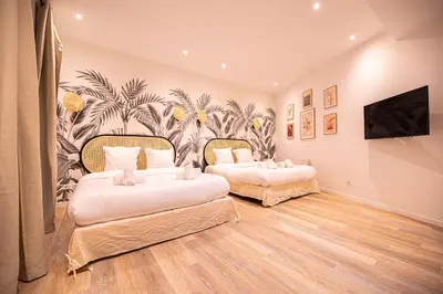 Un ou plusieurs lits dans un hébergement de l'établissement Cosy home - Haut marais