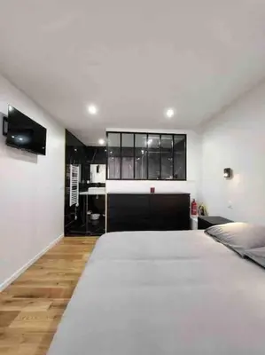 Un ou plusieurs lits dans un hébergement de l'établissement Superbe appartement à 8 minutes de la nation.