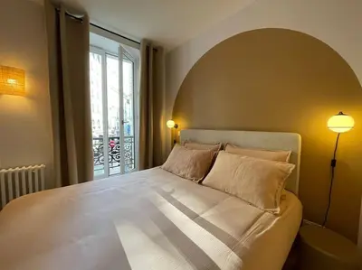 Un ou plusieurs lits dans un hébergement de l'établissement Marais - Bright one-bedroom decorated with taste