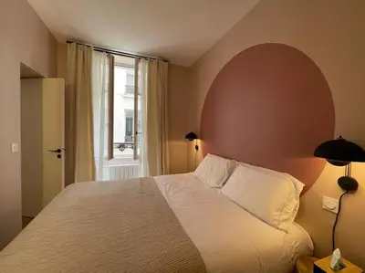 Un ou plusieurs lits dans un hébergement de l'établissement Marais - Quiet one-bedroom decorated with taste