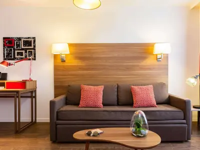 Coin salon dans l'établissement Aparthotel Adagio La Defense Courbevoie