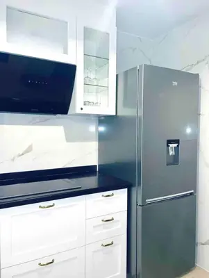 Cuisine ou kitchenette dans l'établissement Proche stade de France avec parking