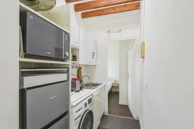 Cuisine ou kitchenette dans l'établissement Appartement Surcouf - Welkeys