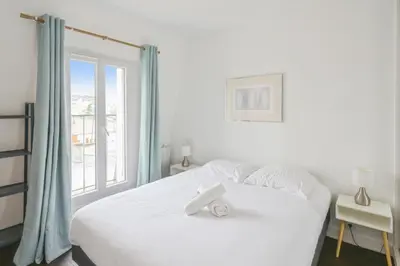 Un ou plusieurs lits dans un hébergement de l'établissement Appartement Surcouf - Welkeys