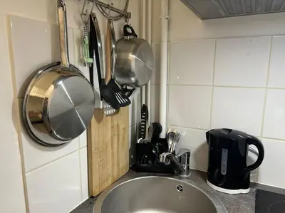 Cuisine ou kitchenette dans l'établissement Cozy studio in Paris 15eme