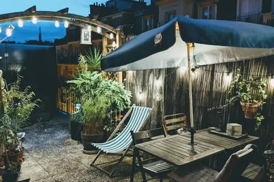 Terrasse ou espace extérieur de l'établissement La Colonie // Cosy - terrasse - Butte aux cailles
