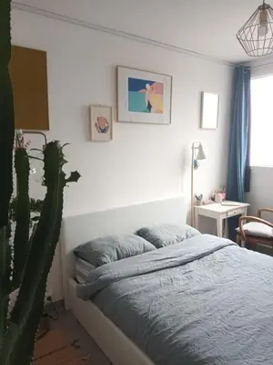 Un ou plusieurs lits dans un hébergement de l'établissement Sunny Flat in Paris