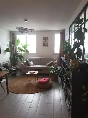 Coin salon dans l'établissement Sunny Flat in Paris