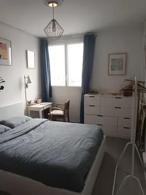 Un ou plusieurs lits dans un hébergement de l'établissement Sunny Flat in Paris