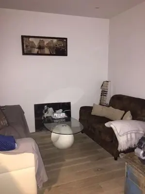 Coin salon dans l'établissement Duplex 45m2 -Zac L’Oreal - Palais de Justice Paris
