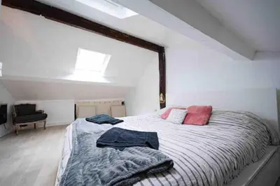 Un ou plusieurs lits dans un hébergement de l'établissement Duplex 45m2 -Zac L’Oreal - Palais de Justice Paris