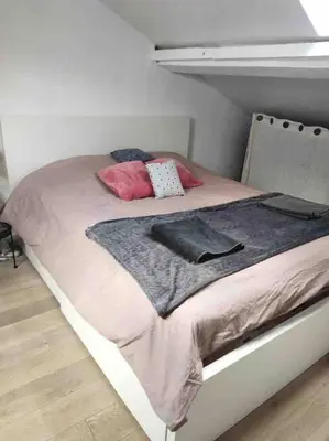 Un ou plusieurs lits dans un hébergement de l'établissement Duplex 45m2 -Zac L’Oreal - Palais de Justice Paris