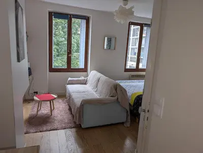 Un ou plusieurs lits dans un hébergement de l'établissement Studio Paris buttes Chaumont