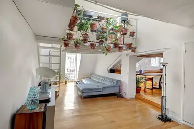 Un ou plusieurs lits dans un hébergement de l'établissement Pretty Parisian Penthouse