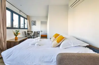 Un ou plusieurs lits dans un hébergement de l'établissement Amazing Appartment 4 Peoples