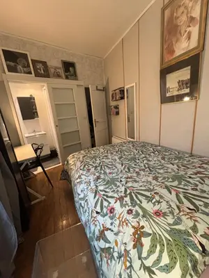 Un ou plusieurs lits dans un hébergement de l'établissement Duplex Marais Square du Temple Parking
