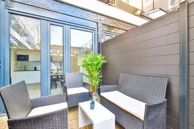 Coin salon dans l'établissement Jolie appartement près du métro
