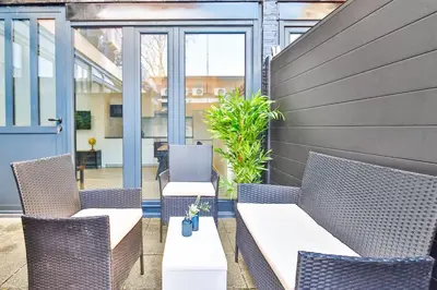 Coin salon dans l'établissement Jolie appartement près du métro