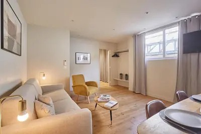 Coin salon dans l'établissement Apartment Center of Paris by Studio prestige