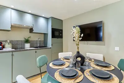 Cuisine ou kitchenette dans l'établissement Apartment Center of Paris by Studio prestige