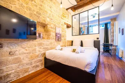 Un ou plusieurs lits dans un hébergement de l'établissement Lovely apartment in Paris -
