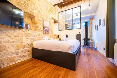 Un ou plusieurs lits dans un hébergement de l'établissement Lovely apartment in Paris -