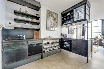 Cuisine ou kitchenette dans l'établissement L'Atelier - Loft rénové en souplex - Tour Eiffel