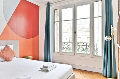 Un ou plusieurs lits dans un hébergement de l'établissement Appartement proche Gare Montparnasse - IV