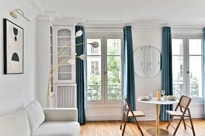 Coin salon dans l'établissement Appartement proche Gare Montparnasse - IV